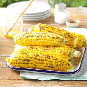 sweet corn freshly harvested and grilled outside