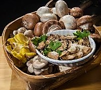 basket of raw mushrooms