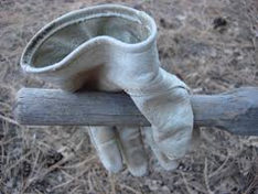 work glove on wooden handle